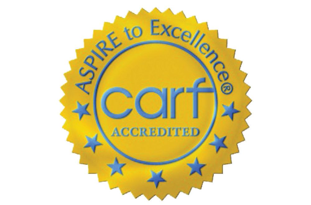 The CARF seal, awarded to institutions which earn accreditation. 